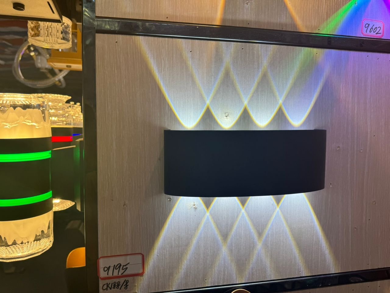 Applique murale moderne avec double faisceau lumineux